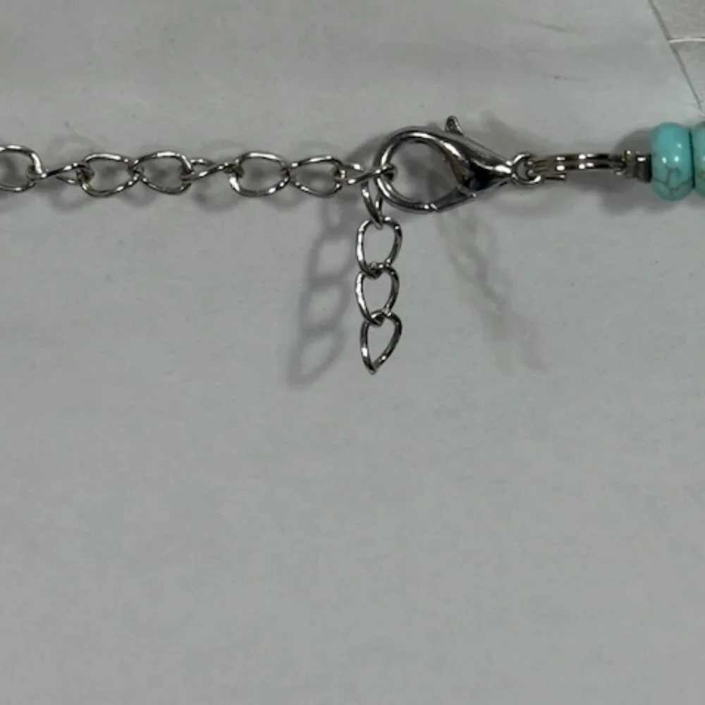 Silver-tone and turquoise-colored 18